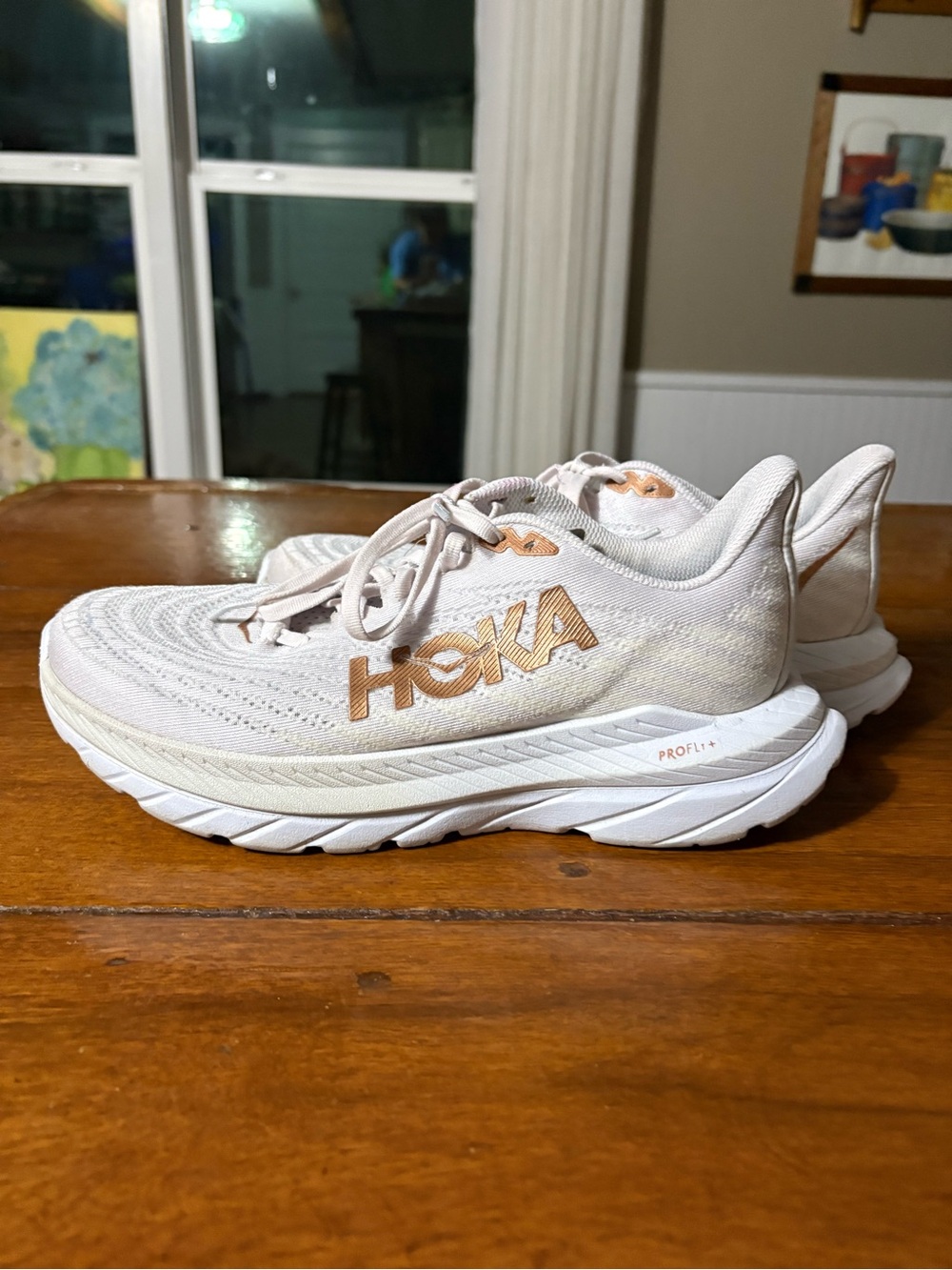 Hoka Women's Running Shoes in Cream with Gold Accents